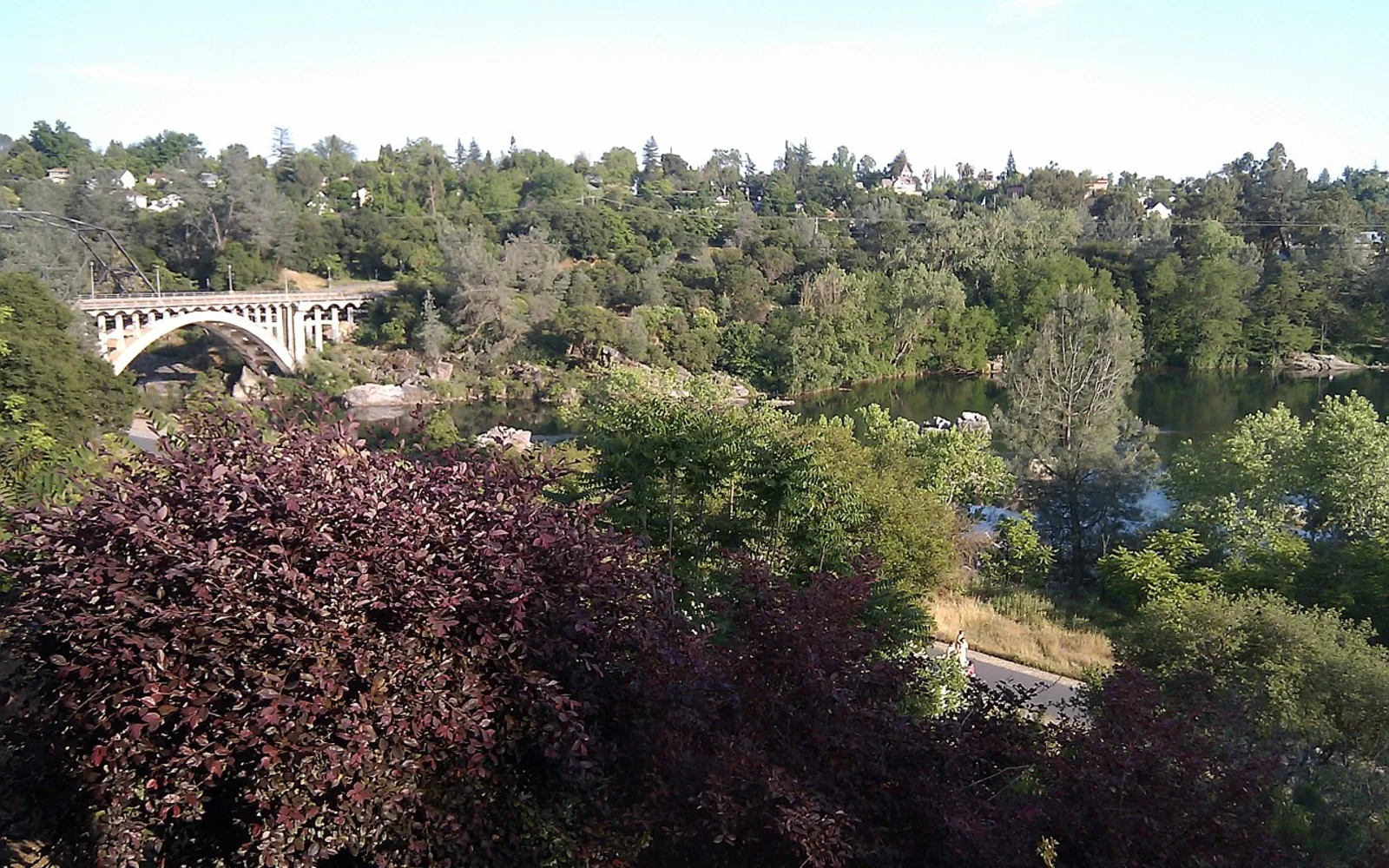 A historic bridge structure spanning the American River near Folsom, representing the region's preserved infrastructure from the Gold Rush era.