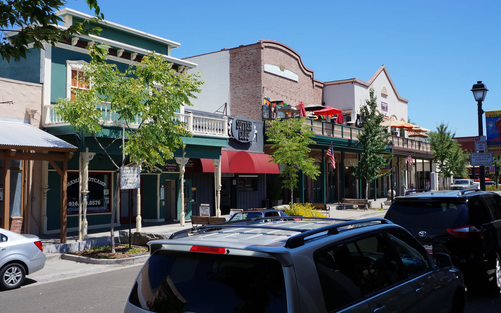 Historic buildings and storefronts lining Sutter Street in downtown Folsom, showcasing the city's preserved Gold Rush era architecture.